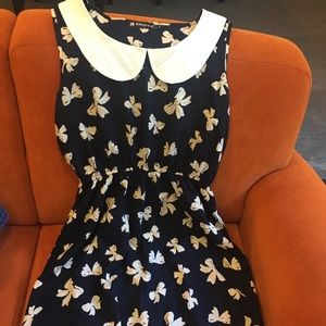 Bow-pattern dress with Peter Pan collar